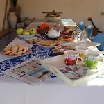 Couette-café S'arenada